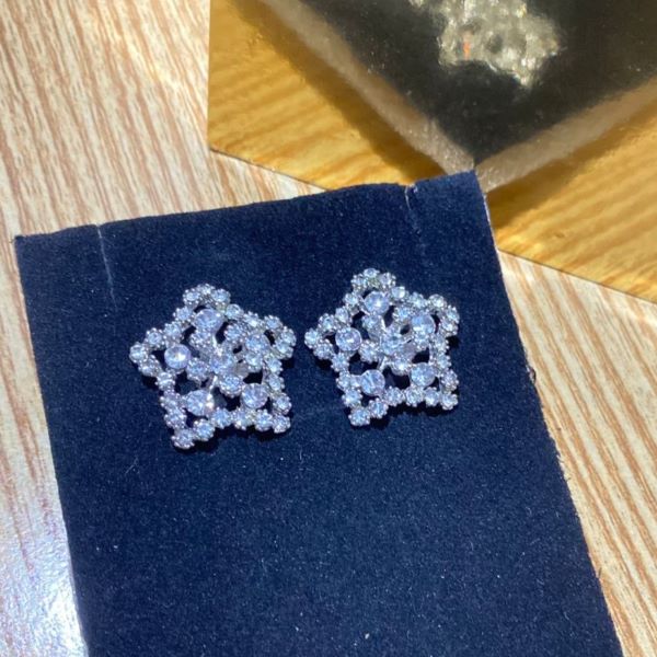Elegant Crystal Floral Star Stud Earrings – Silver Tone
