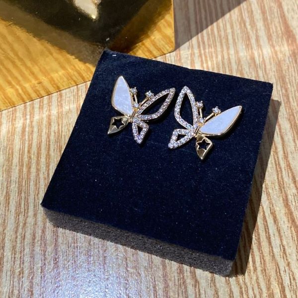 Elegant Butterfly Crystal Stud Earrings – White & Gold Tone - Image 2