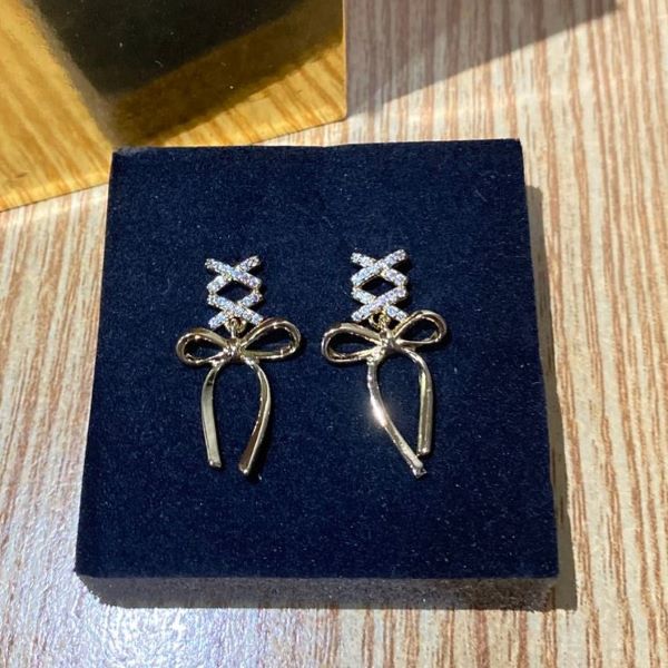 Gold Bow Knot Drop Earrings with Crystal Accents - Image 2