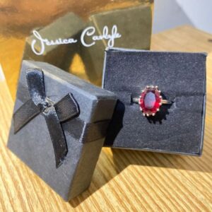 Elegant Oval Red Crystal Halo Ring – Silver Tone
